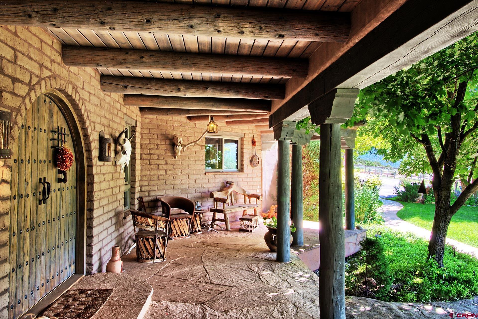2000 Castle Peak Ranch Road Eagle, CO 81631 - Photo 11 of 35 a building outdoor space with patio furniture and potted plants