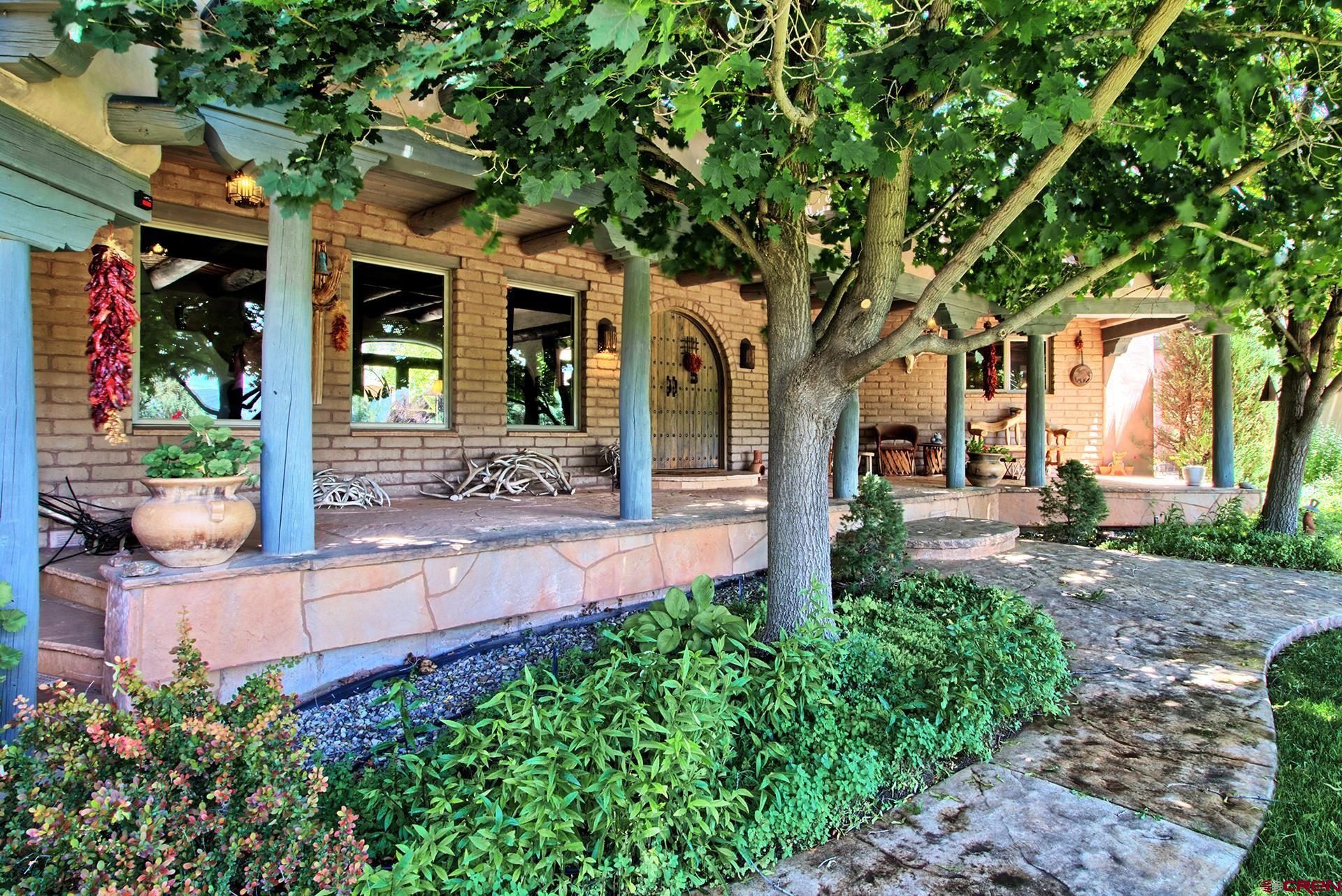 2000 Castle Peak Ranch Road Eagle, CO 81631 - Photo 14 of 35 a front view of a house with garden
