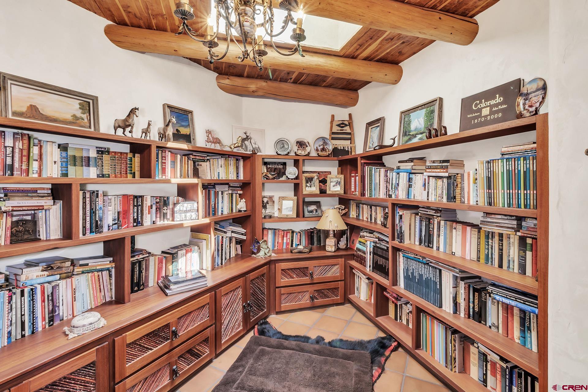 2000 Castle Peak Ranch Road Eagle, CO 81631 - Photo 27 of 35 a book shelf with lots of books in it
