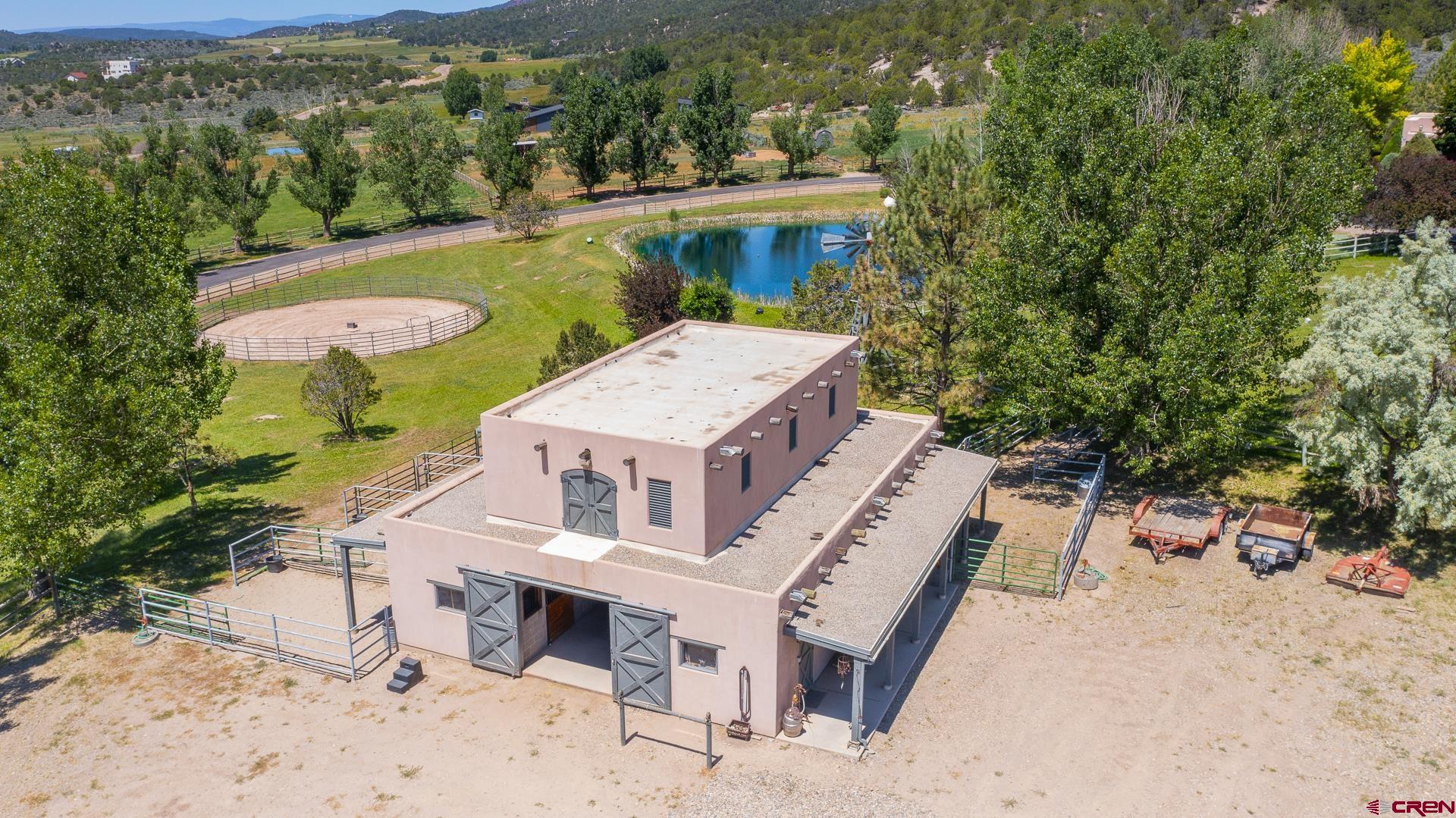 2000 Castle Peak Ranch Road Eagle, CO 81631 - Photo 6 of 35 an aerial view of a house with a swimming pool