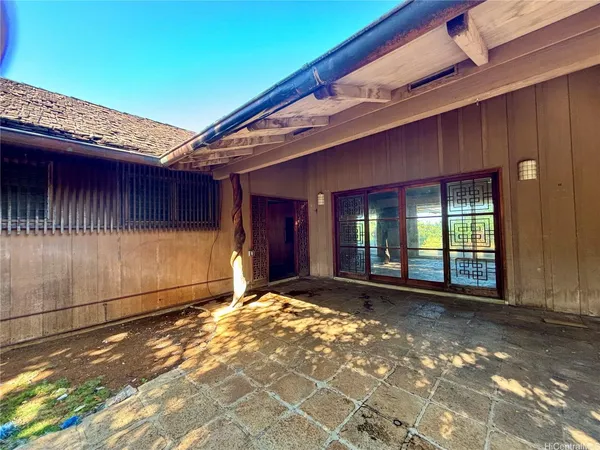a view of a house with a patio
