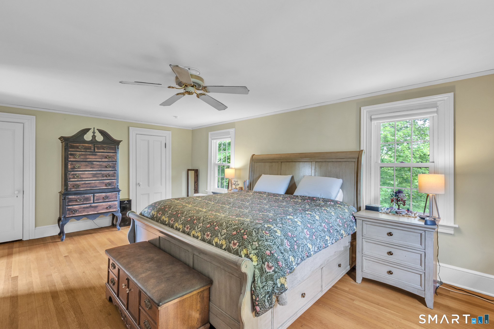 808 Branch Road Suffield, CT 06078 - Photo 21 of 40 a bedroom with a bed and a dresser