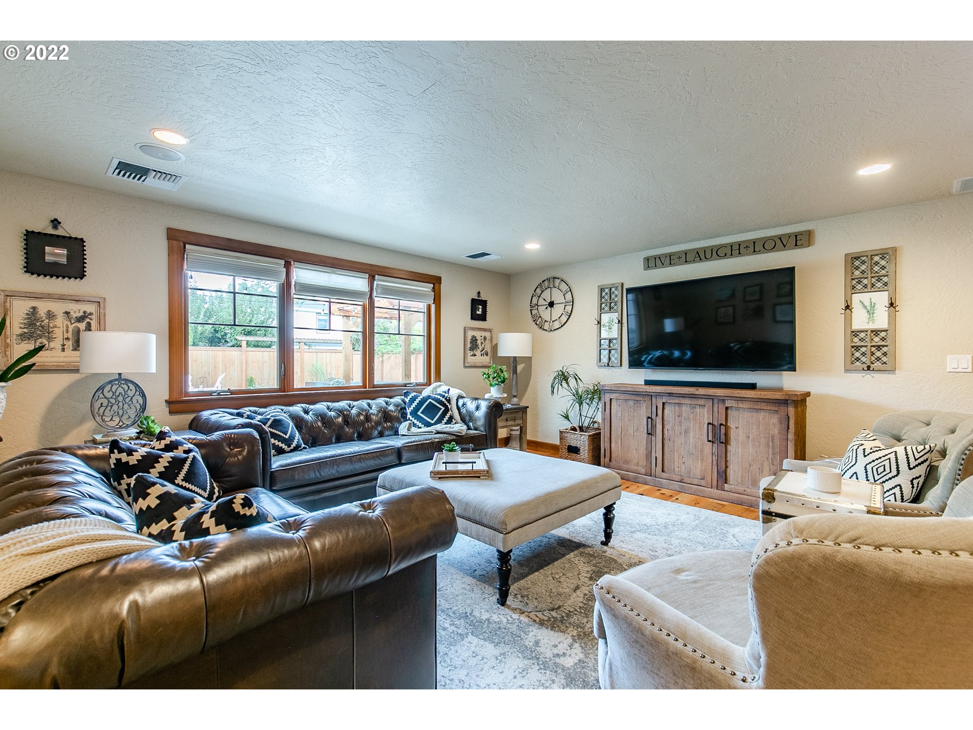 2115 Bedford Way Eugene, OR 97401 - Photo 12 of 32 a living room with furniture and a flat screen tv