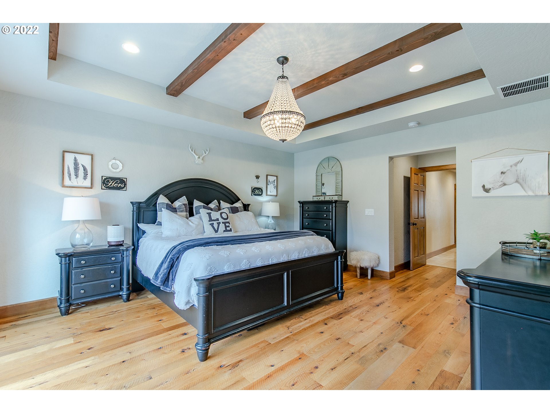 2115 Bedford Way Eugene, OR 97401 - Photo 18 of 32 a bedroom with a bed and a dresser