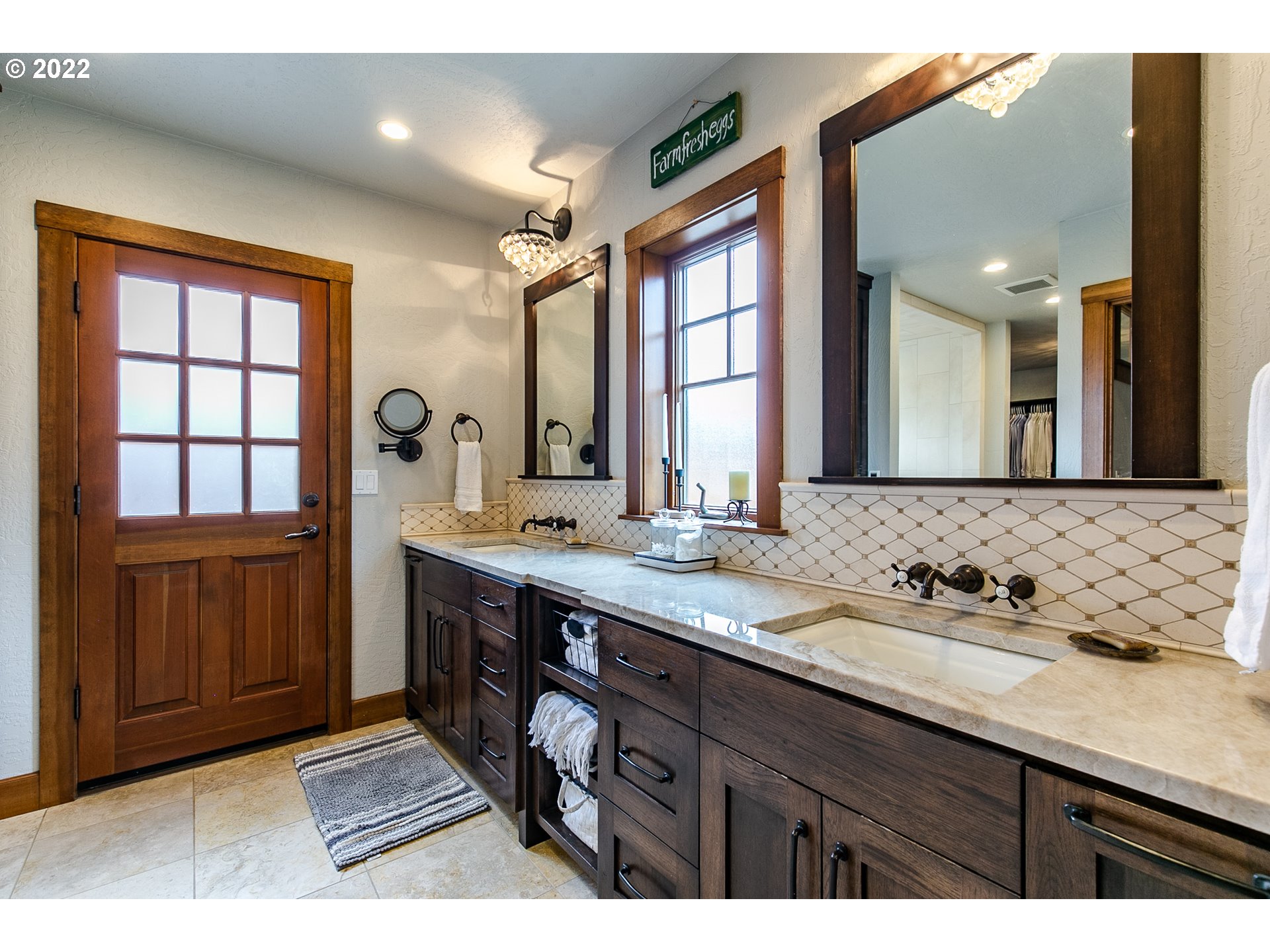 2115 Bedford Way Eugene, OR 97401 - Photo 19 of 32 a bathroom with a double vanity sink and a mirror