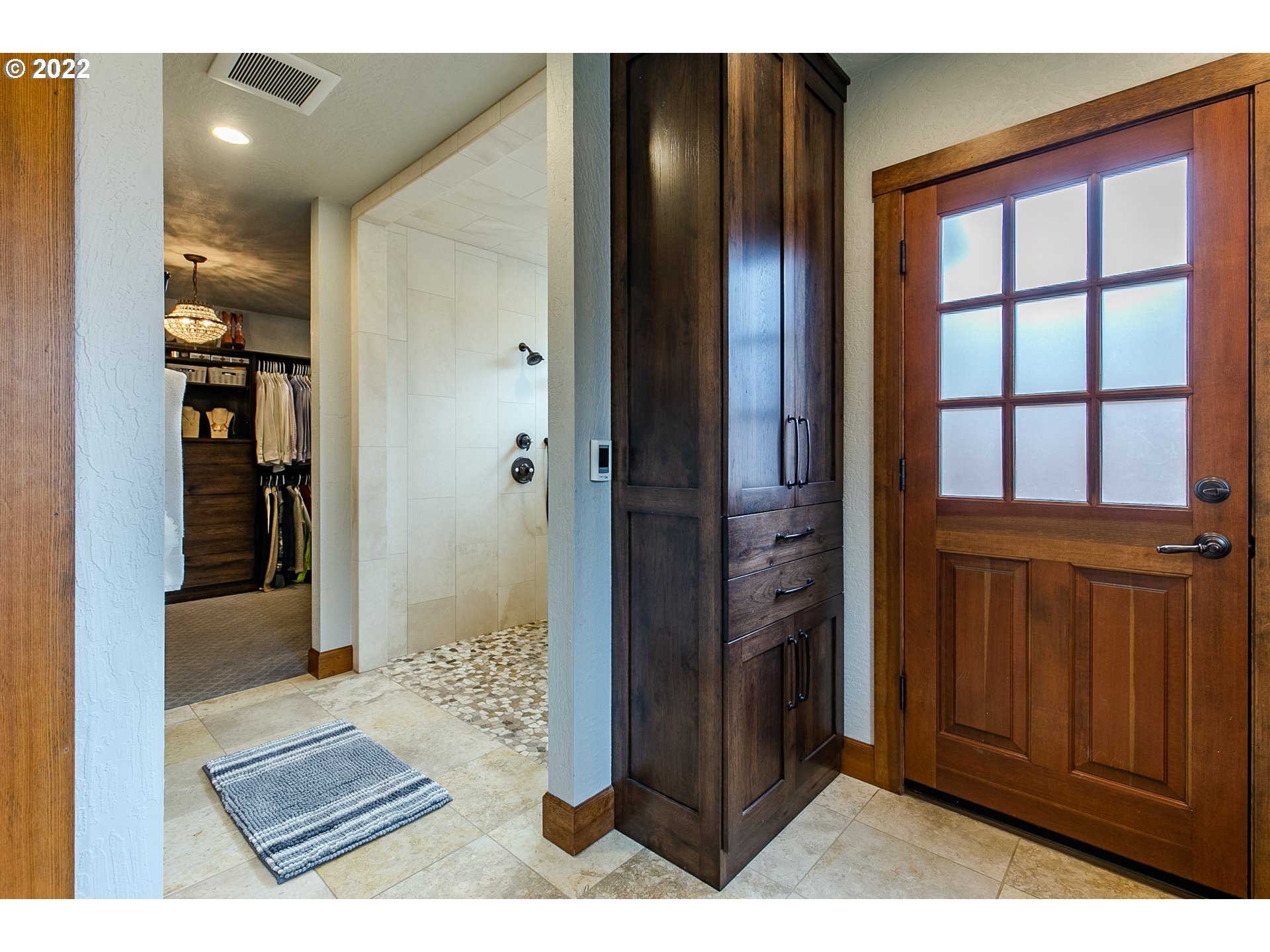 2115 Bedford Way Eugene, OR 97401 - Photo 20 of 32 a view of a bathroom with a glass door shower and a sink