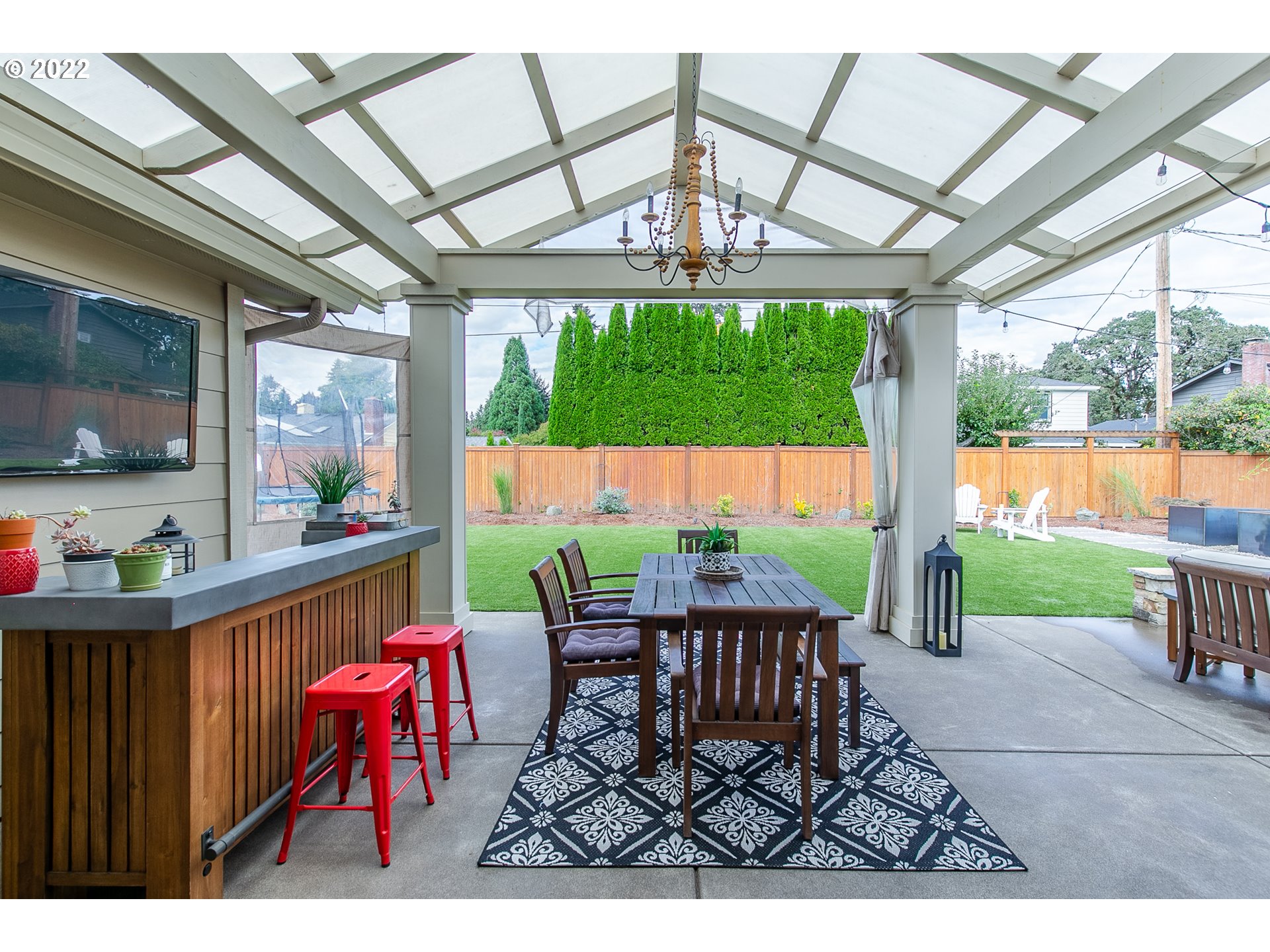 2115 Bedford Way Eugene, OR 97401 - Photo 26 of 32 a view of a patio with a table chairs and a patio