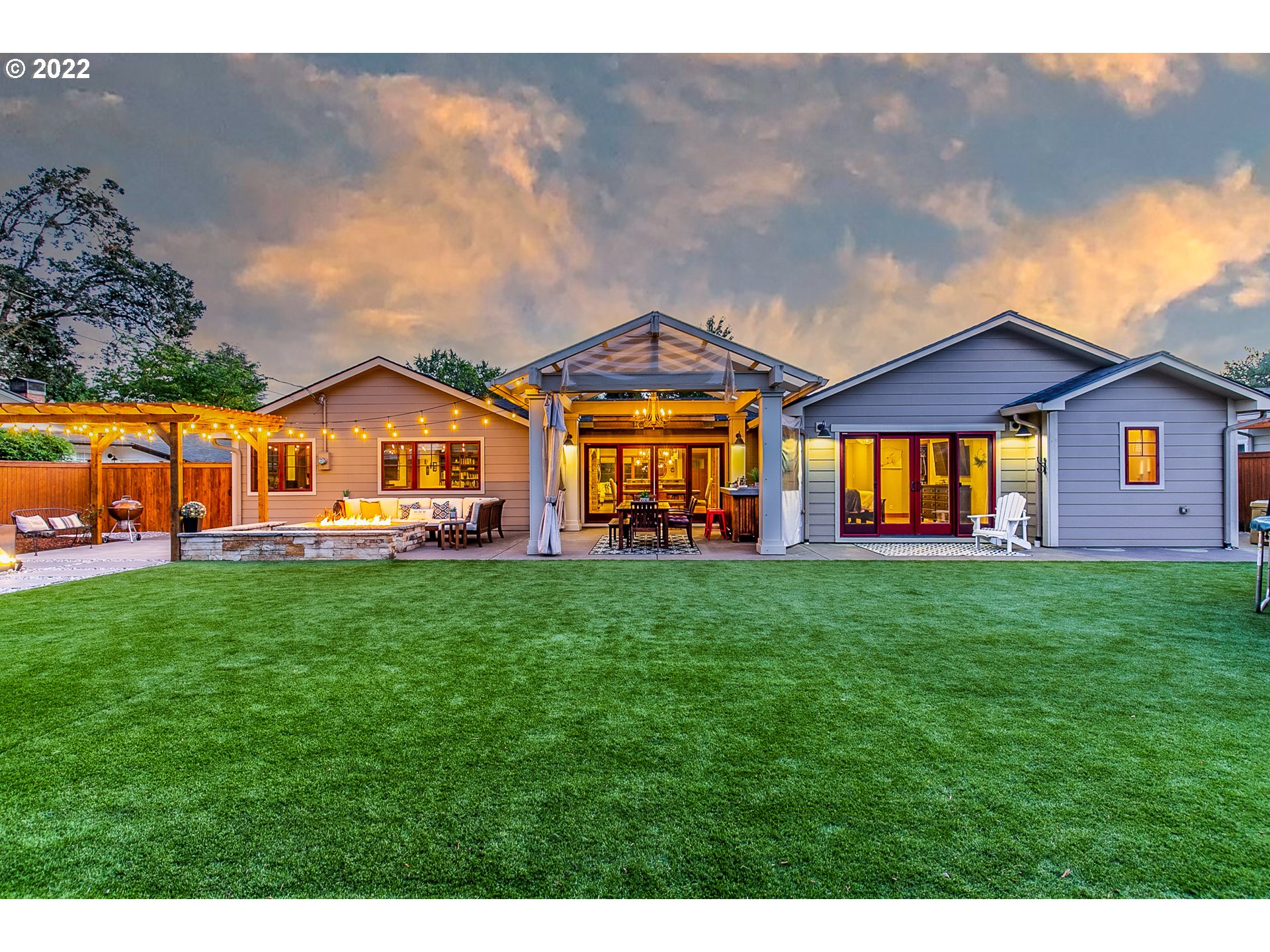 2115 Bedford Way Eugene, OR 97401 - Photo 28 of 32 a view of a big yard with table and chairs under an umbrella