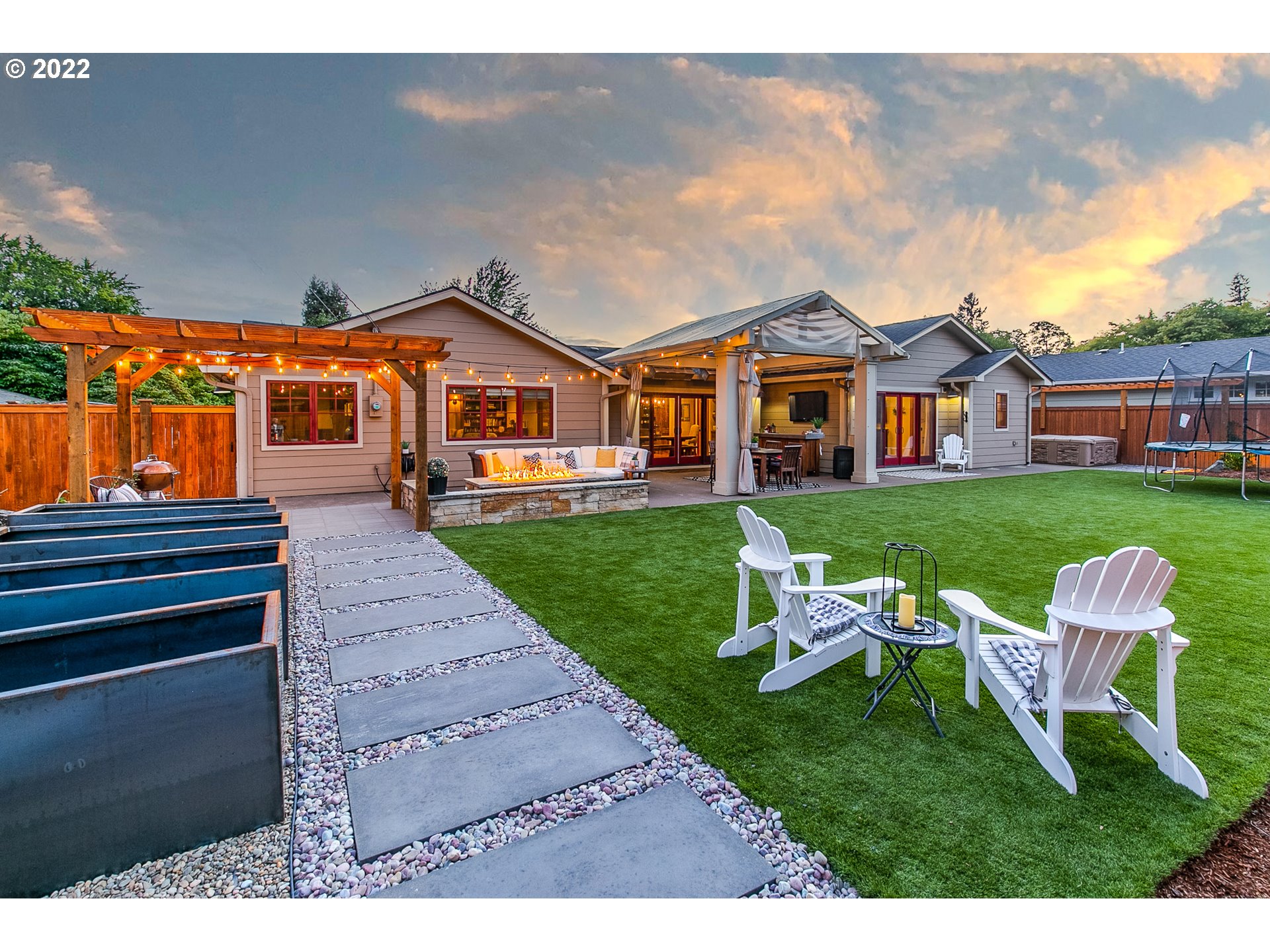 2115 Bedford Way Eugene, OR 97401 - Photo 32 of 32 a backyard of a house with a garden and barbeque oven