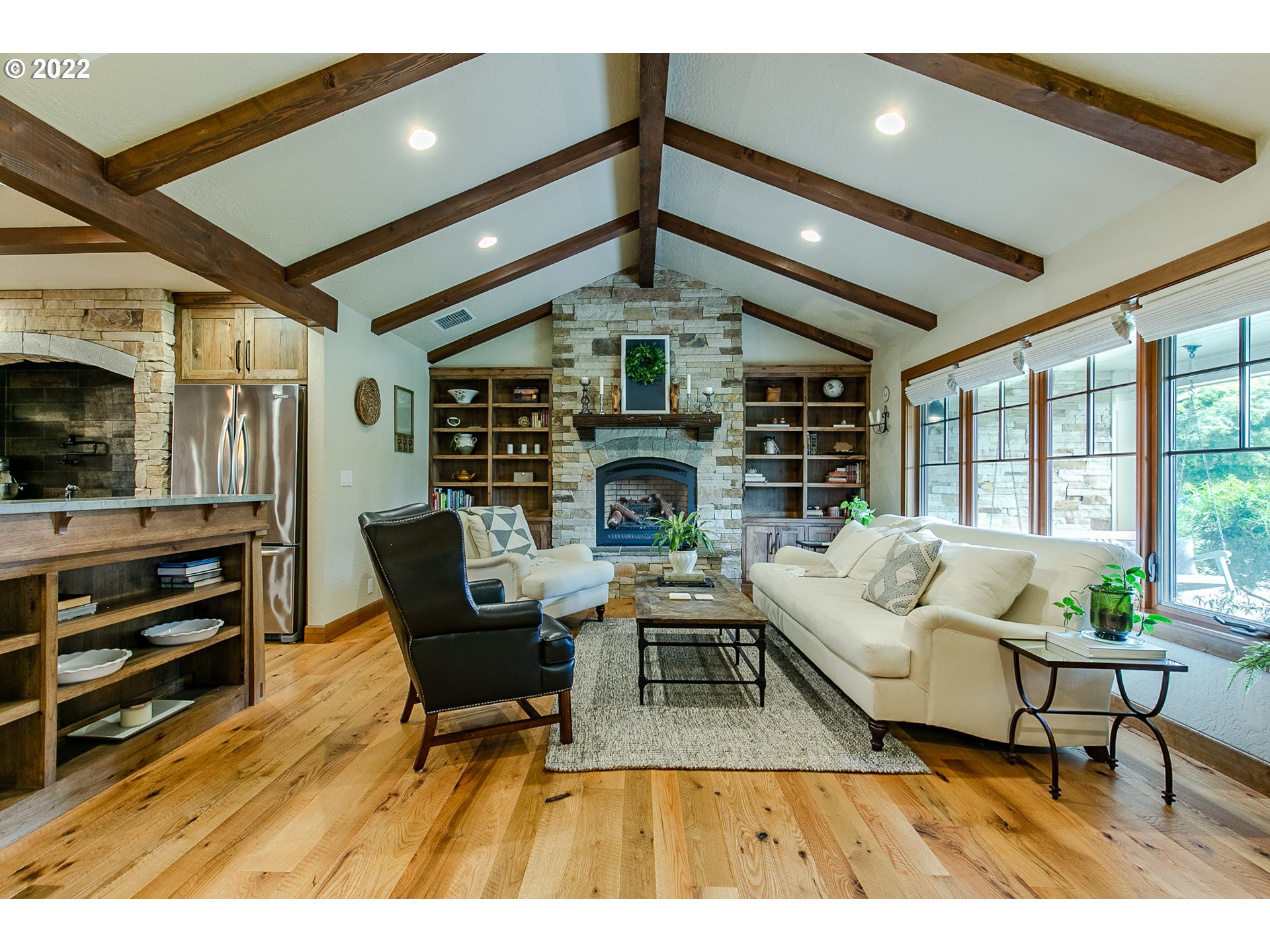 2115 Bedford Way Eugene, OR 97401 - Photo 4 of 32 a living room with furniture and a fireplace