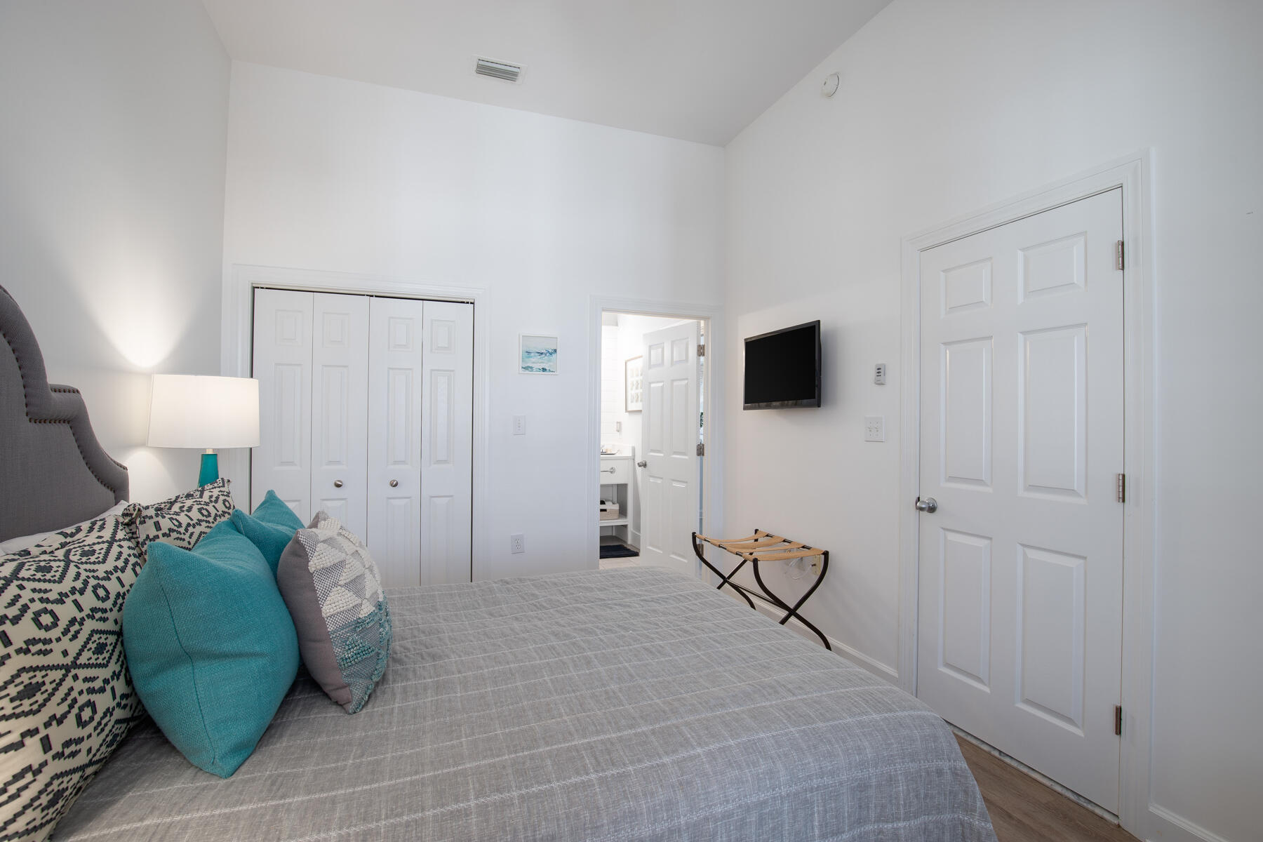10343 East County Highway 30A, Unit 330 Inlet Beach, FL 32413 - Photo 17 of 30 a bedroom with a bed and a flat screen tv