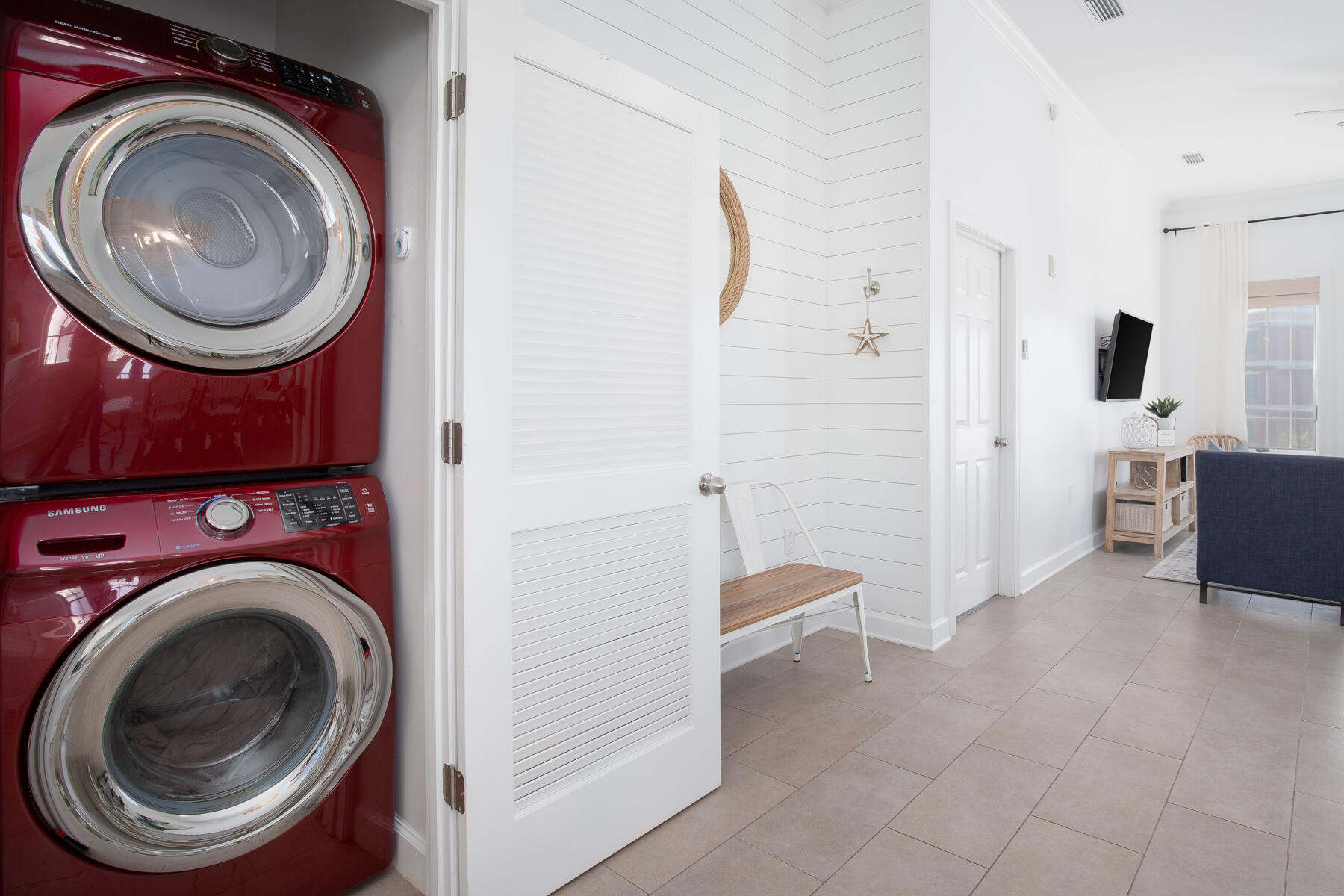 10343 East County Highway 30A, Unit 330 Inlet Beach, FL 32413 - Photo 21 of 30 a view of a hallway with washer and dryer