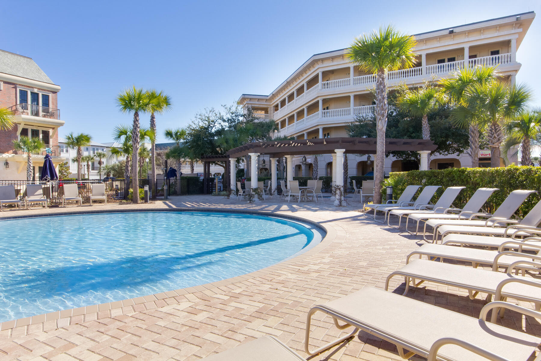10343 East County Highway 30A, Unit 330 Inlet Beach, FL 32413 - Photo 26 of 30 a view of a chairs and table in the patio