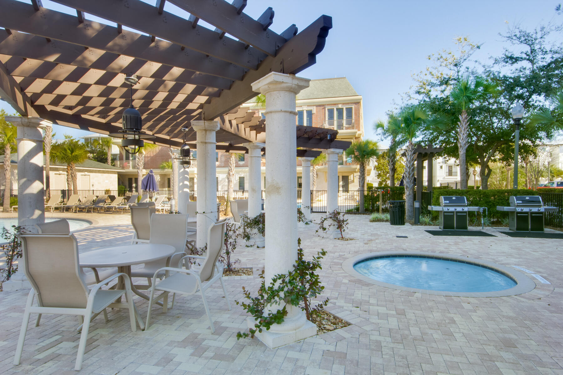 10343 East County Highway 30A, Unit 330 Inlet Beach, FL 32413 - Photo 27 of 30 a view of a chairs and table in the patio