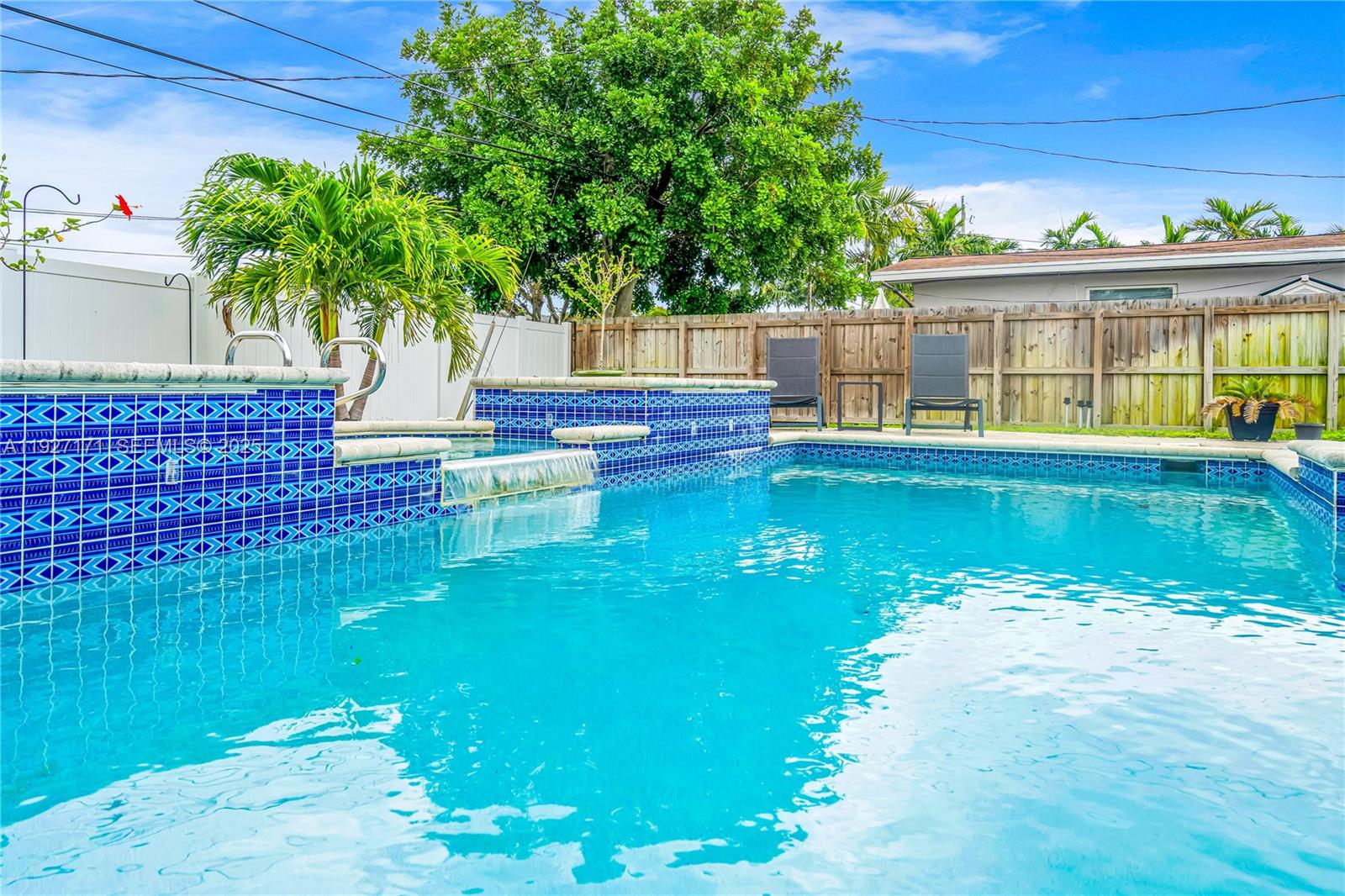 251 Southeast 8th Street Pompano Beach, FL 33060 - Photo 33 of 34 a view of a house with a yard