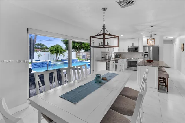 a view of a dining room and livingroom view