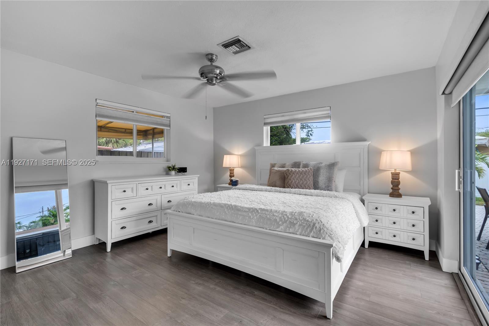 251 Southeast 8th Street Pompano Beach, FL 33060 - Photo 10 of 34 a bedroom with bed and windows