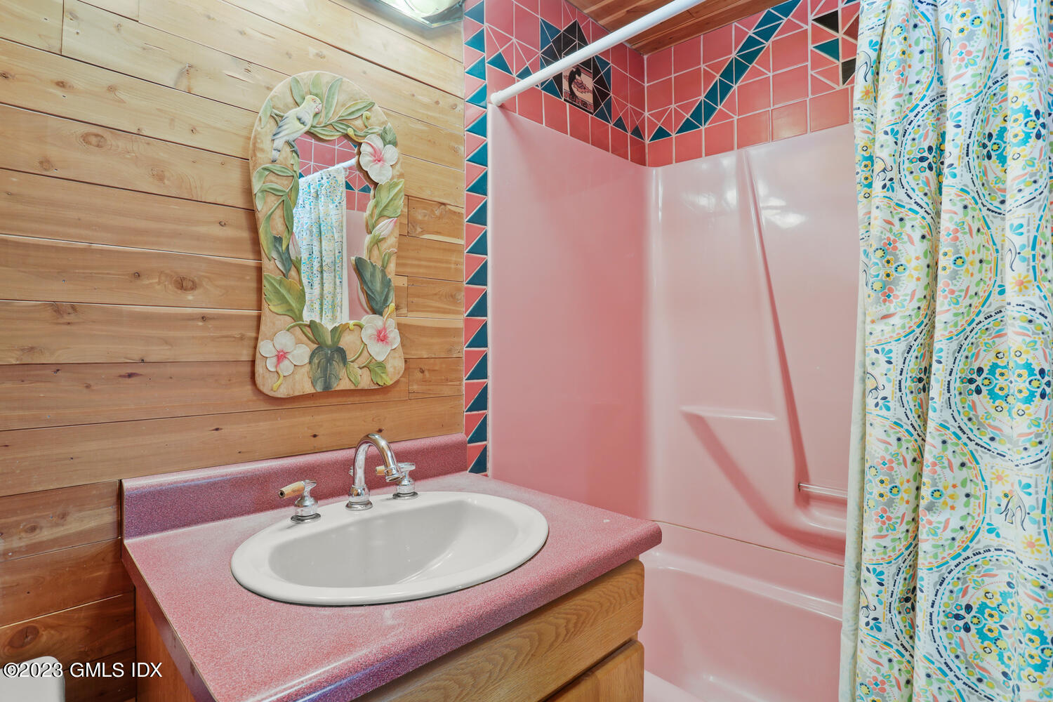 175 Davis Avenue Greenwich, CT 06830 - Photo 16 of 27 a bathroom with a sink and a mirror