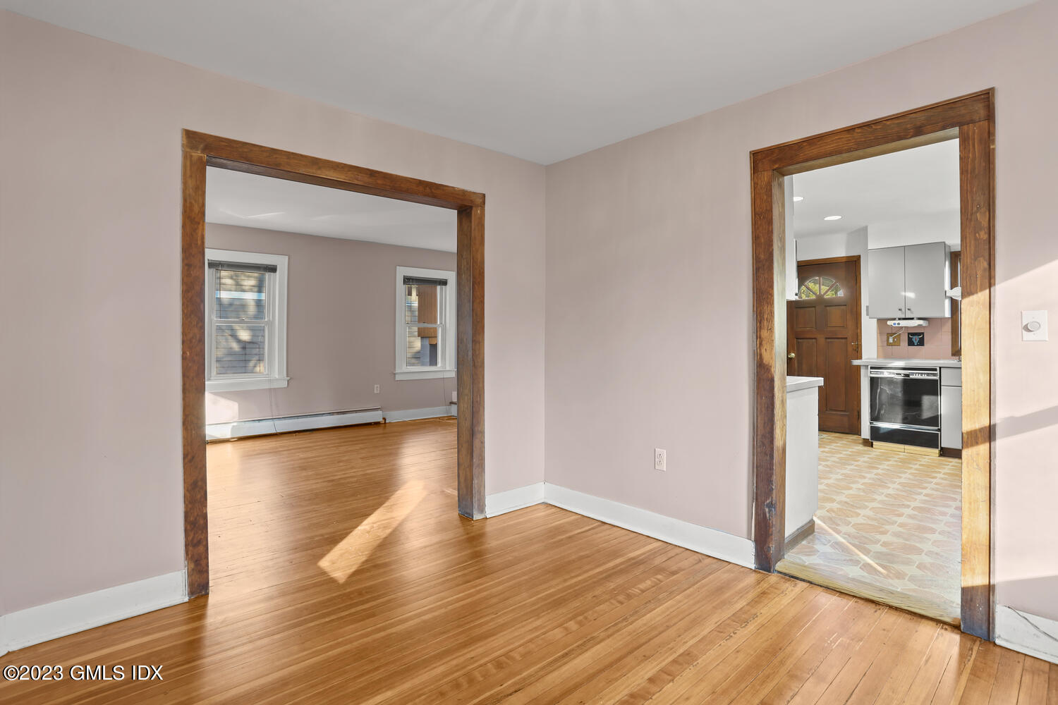 175 Davis Avenue Greenwich, CT 06830 - Photo 5 of 27 a view of a room with wooden floor and a bathroom