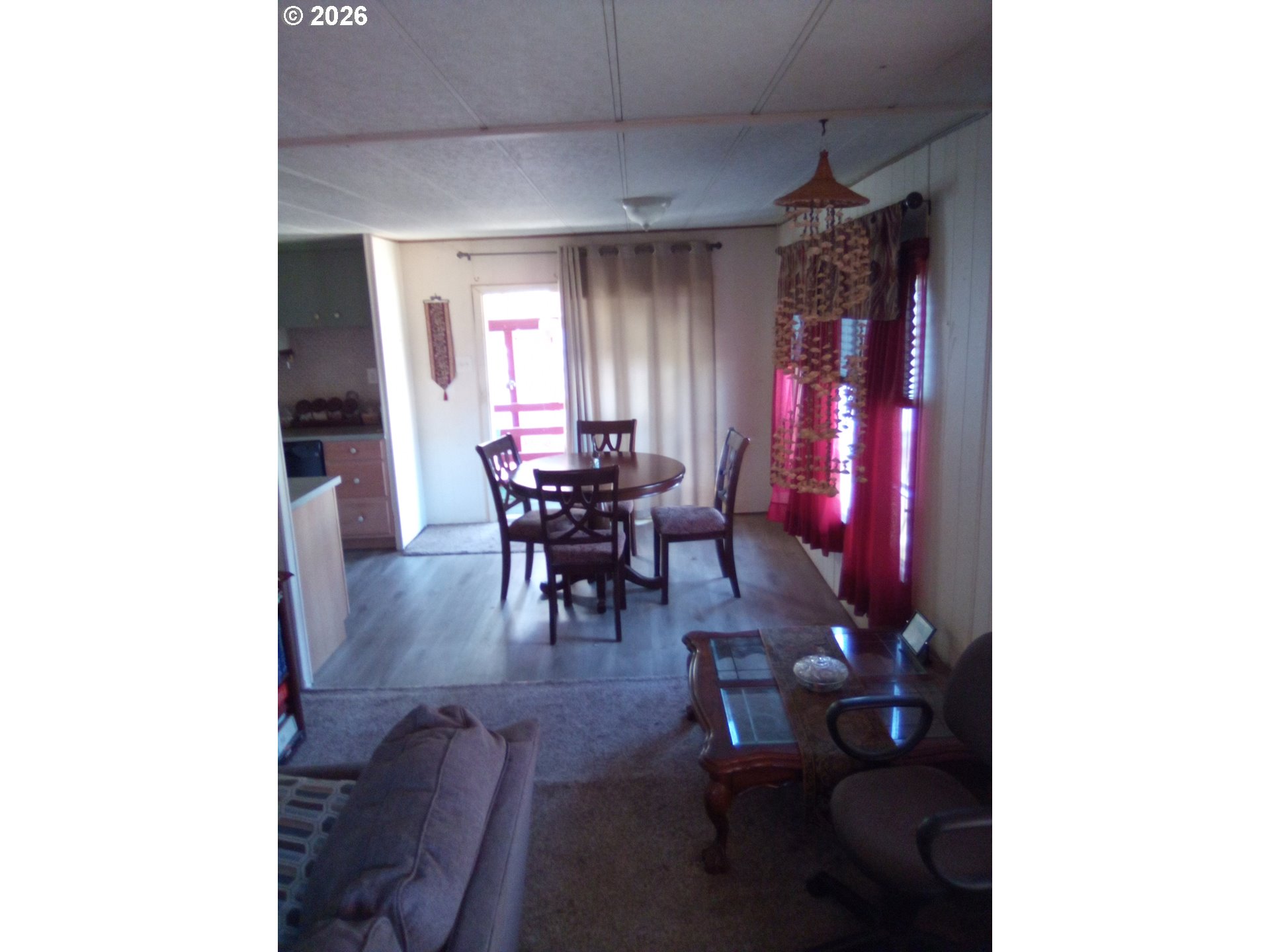 77500 South 6th Street Cottage Grove, OR 97424 - Photo 12 of 16 a dining room with furniture and wooden floor