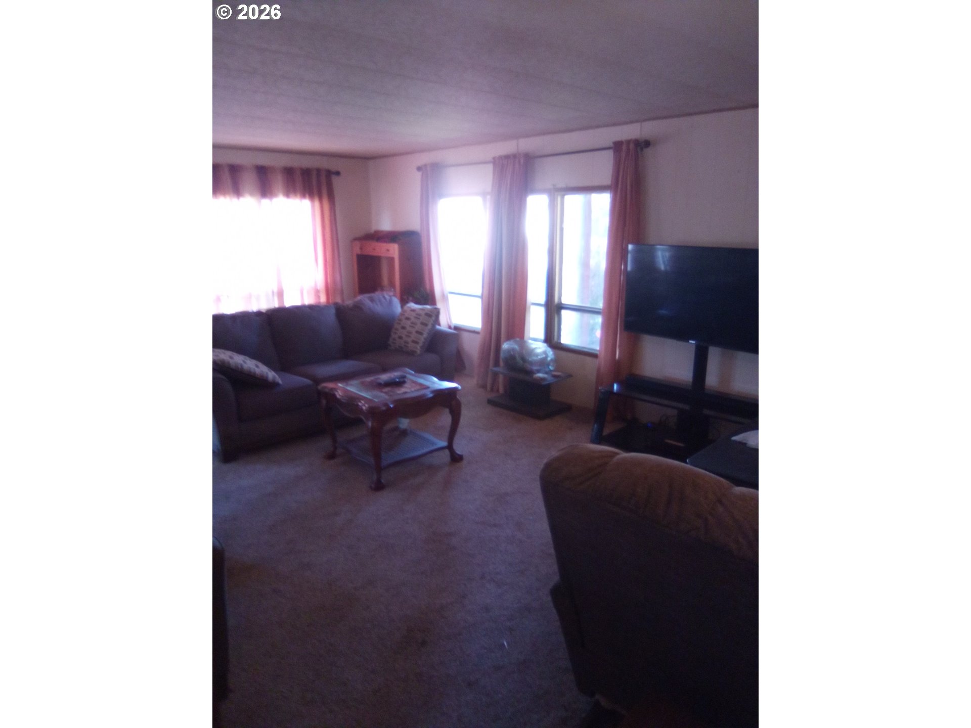 77500 South 6th Street Cottage Grove, OR 97424 - Photo 14 of 16 a living room with furniture and a large window