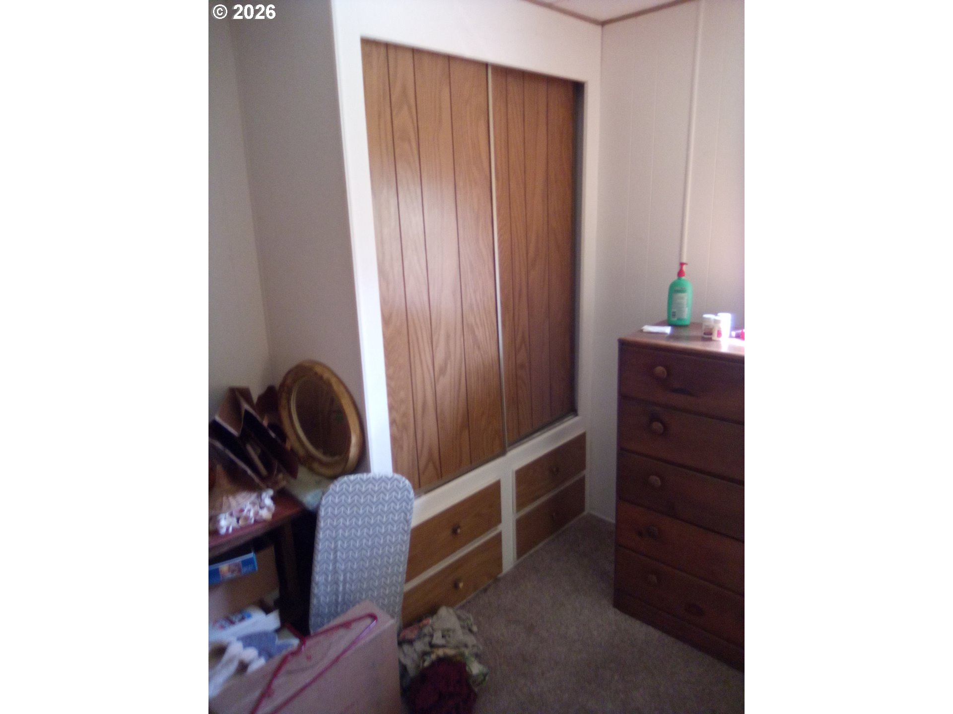 77500 South 6th Street Cottage Grove, OR 97424 - Photo 15 of 16 a room with a chair and dryer