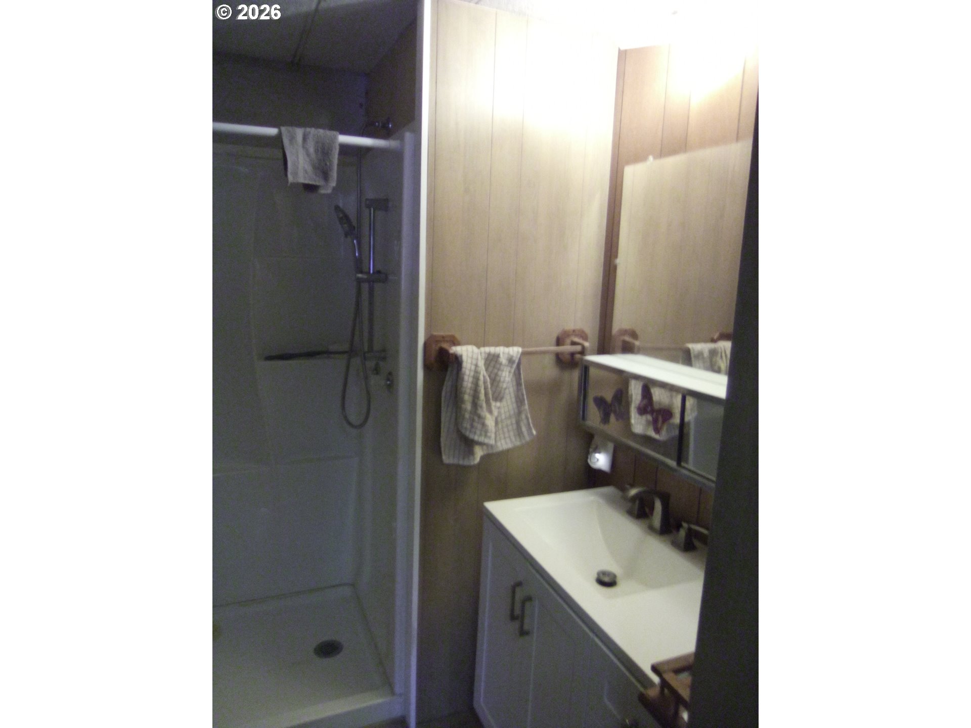 77500 South 6th Street Cottage Grove, OR 97424 - Photo 16 of 16 a bathroom with a sink a toilet and shower