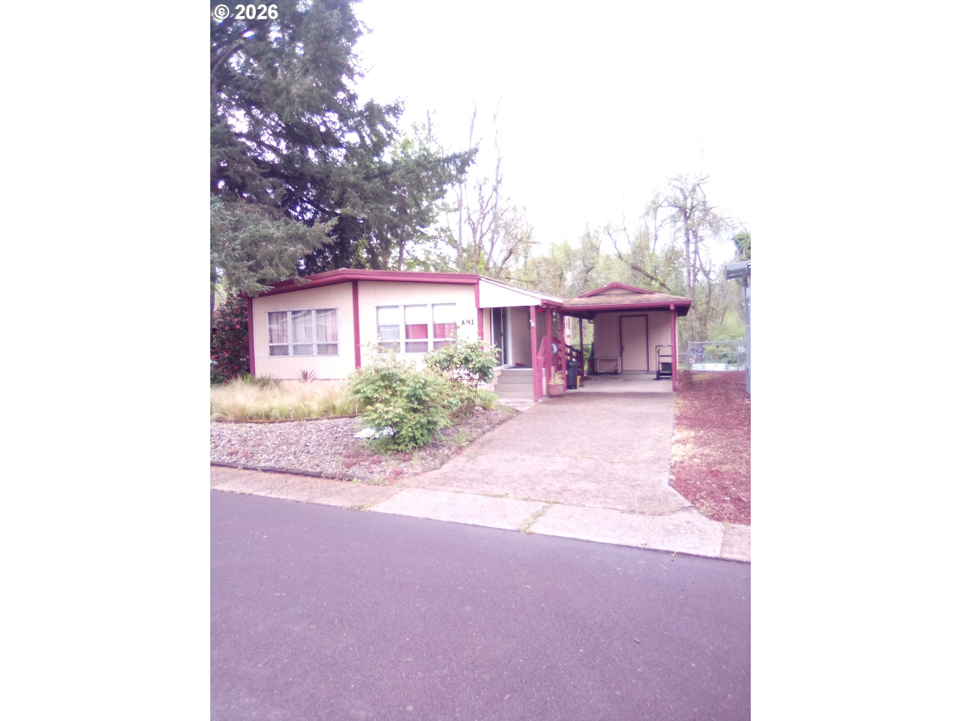 77500 South 6th Street Cottage Grove, OR 97424 - Photo 3 of 16 a view of a house with a patio