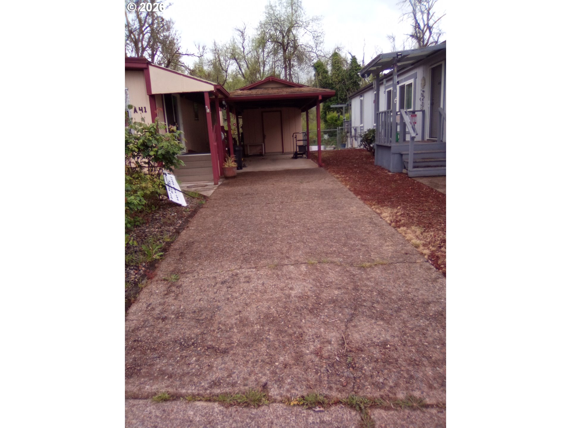 77500 South 6th Street Cottage Grove, OR 97424 - Photo 4 of 16 a view of a house with a porch and sitting area