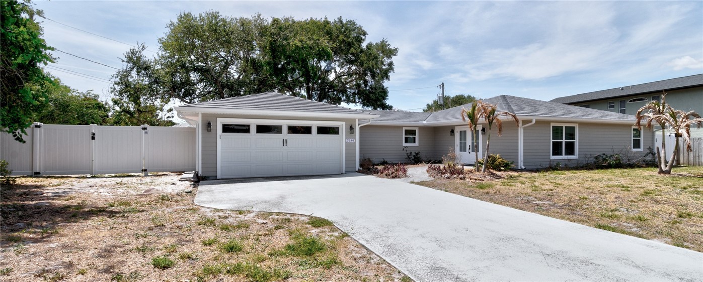 7989 143rd Street Sebastian, FL 32958 - Photo 30 of 30 a front view of a house with a patio