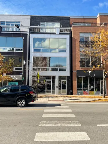 a car parked in front of a building
