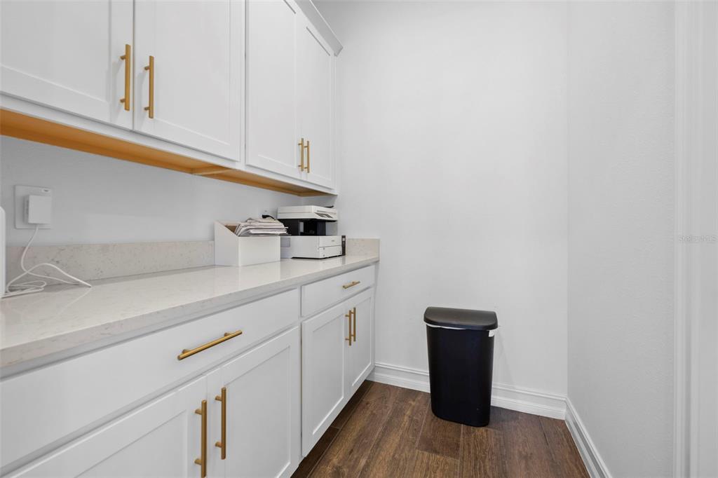 4898 Southern Valley Loop Brooksville, FL 34601 - Photo 35 of 81 a kitchen with a sink and a stove top oven