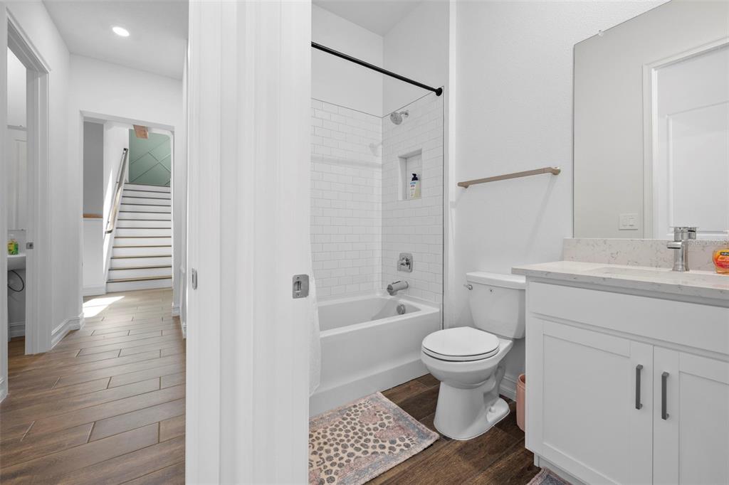 4898 Southern Valley Loop Brooksville, FL 34601 - Photo 56 of 81 a bathroom with a sink toilet and shower