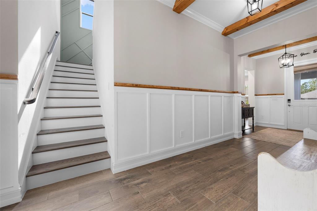 4898 Southern Valley Loop Brooksville, FL 34601 - Photo 58 of 81 a view of a room with stairs and a view of bedroom