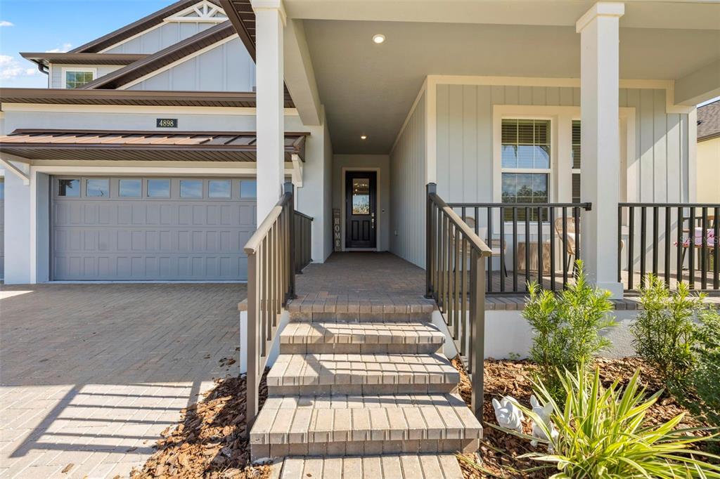 4898 Southern Valley Loop Brooksville, FL 34601 - Photo 7 of 81 a view of a entryway door of the house