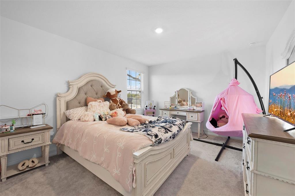 4898 Southern Valley Loop Brooksville, FL 34601 - Photo 73 of 81 a bedroom with a bed and a window