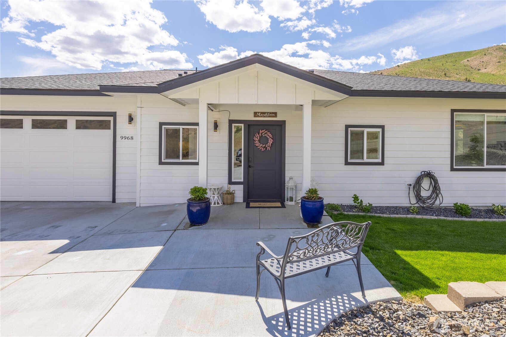 9968 Griffith Place Entiat, WA 98822 - Photo 2 of 38 a view of a house with backyard and sitting area
