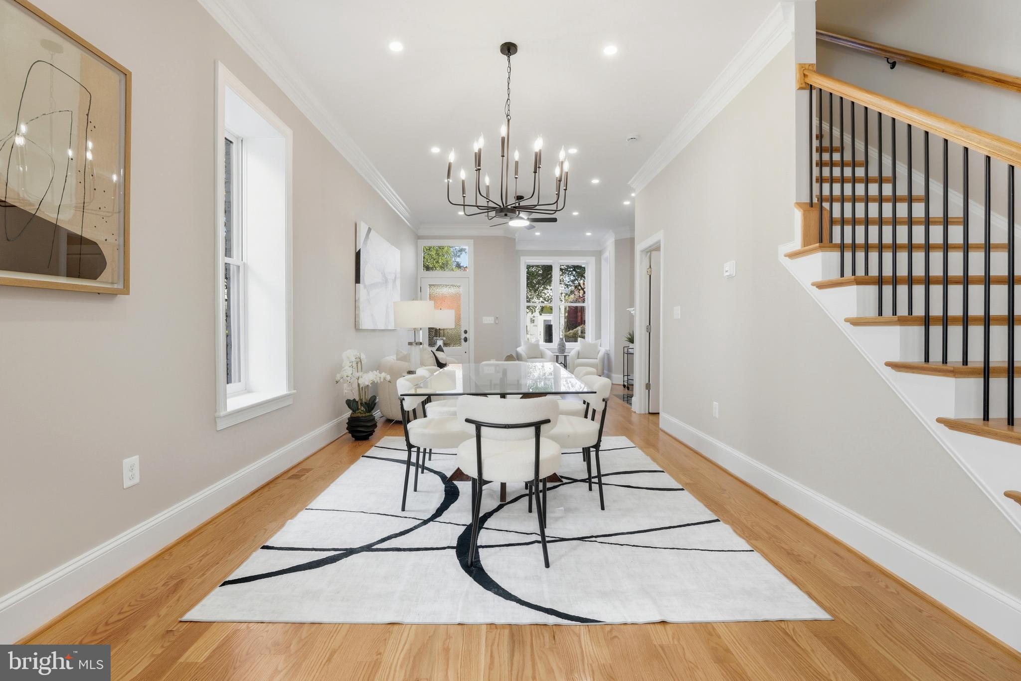 910 Westminster Street Northwest Washington, DC 20001 - Photo 11 of 66 a view of a dining room with furniture a chandelier and wooden floor