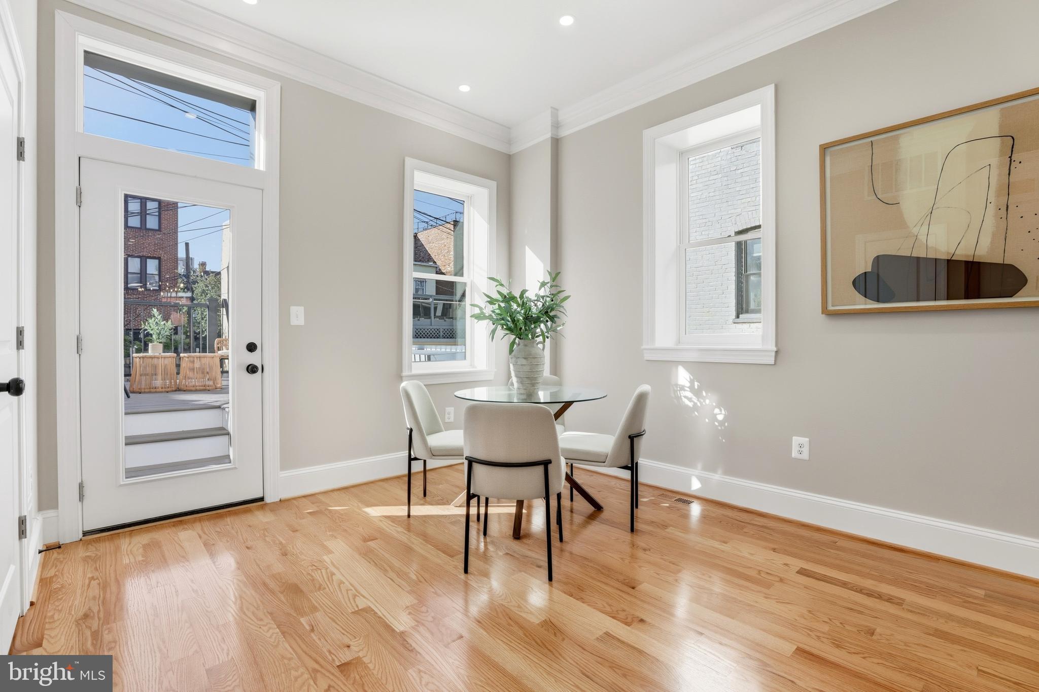 910 Westminster Street Northwest Washington, DC 20001 - Photo 17 of 66 a dining room with furniture and window