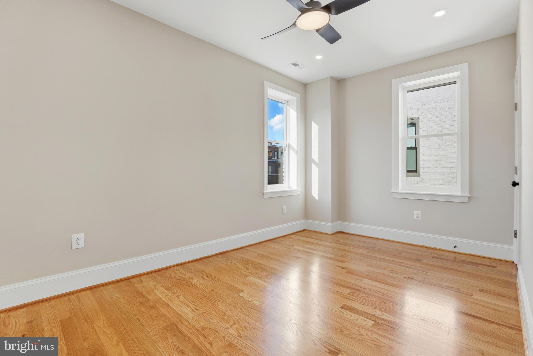 910 Westminster Street Northwest Washington, DC 20001 - Photo 24 of 66 wooden floor in an empty room with a window