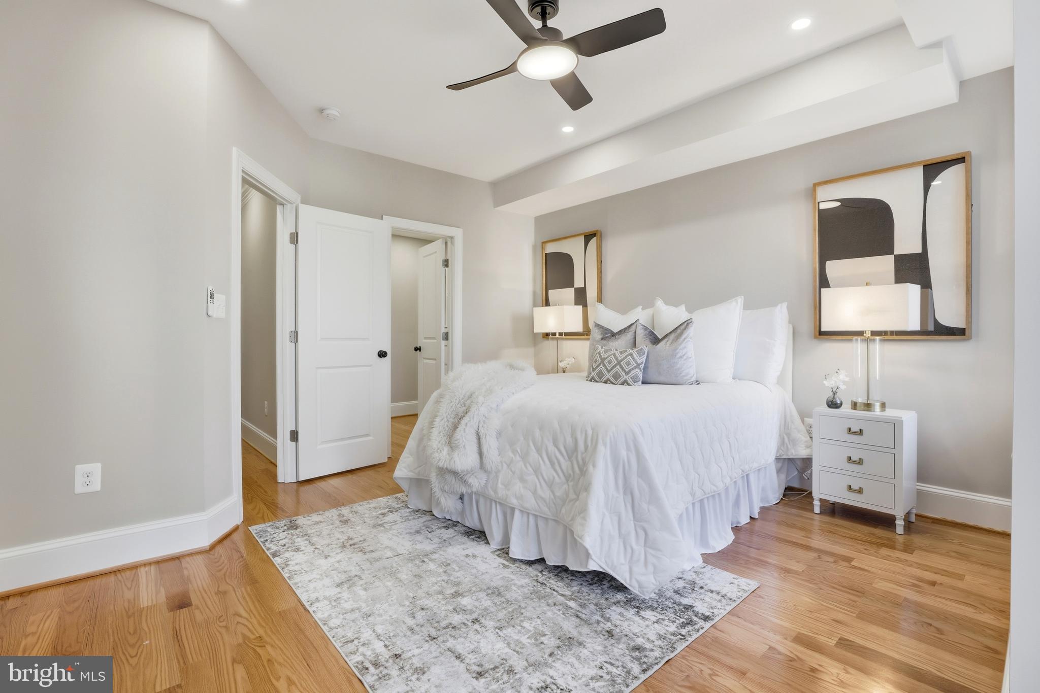 910 Westminster Street Northwest Washington, DC 20001 - Photo 30 of 66 a bed room with a bed and a window