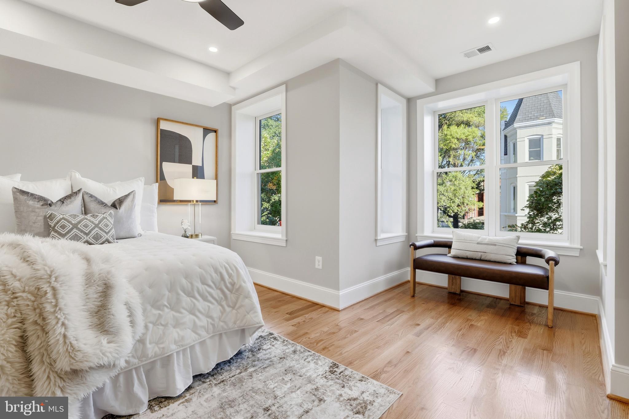 910 Westminster Street Northwest Washington, DC 20001 - Photo 31 of 66 a bedroom with a bed and a large window