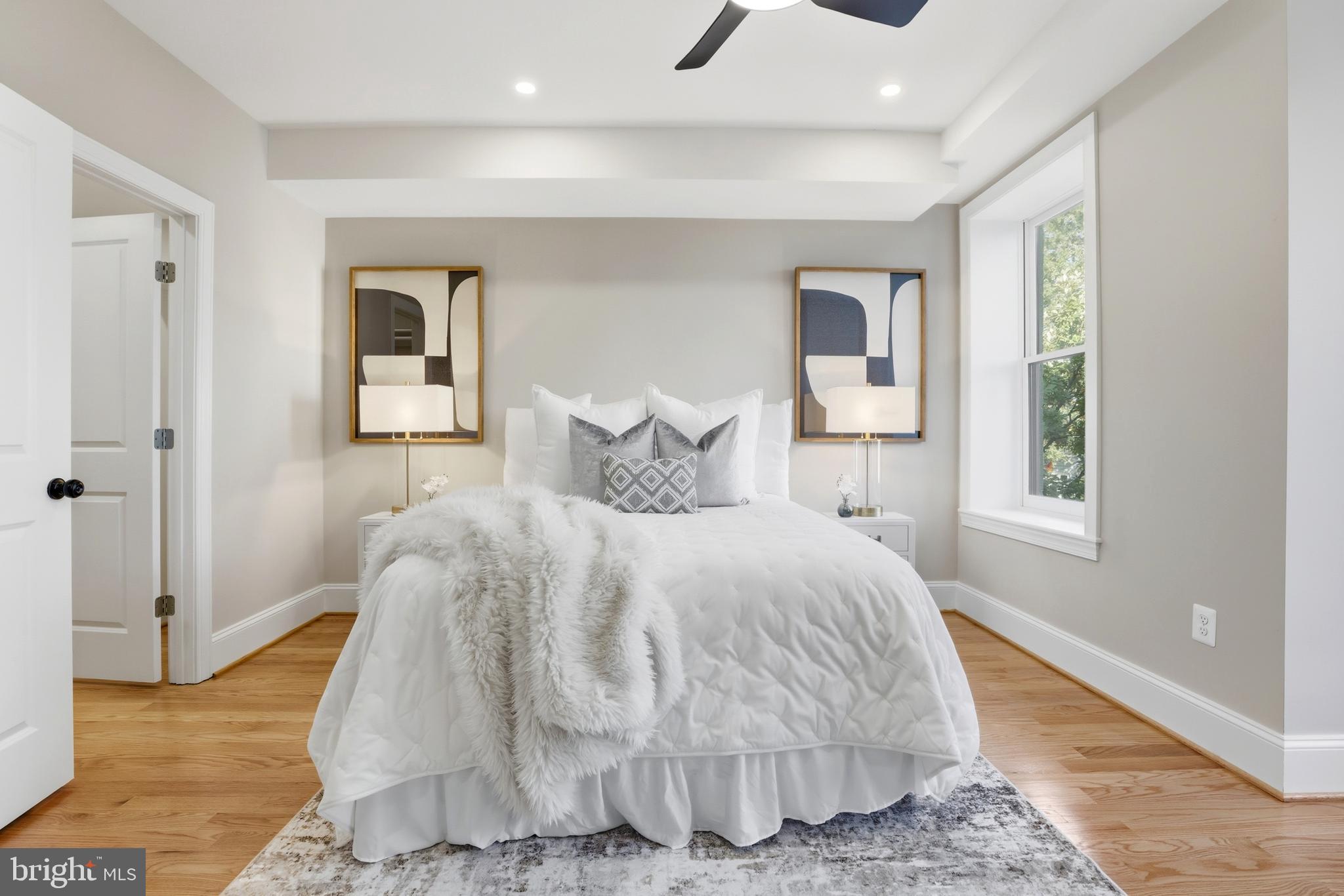 910 Westminster Street Northwest Washington, DC 20001 - Photo 32 of 66 a bedroom with a bed and a window