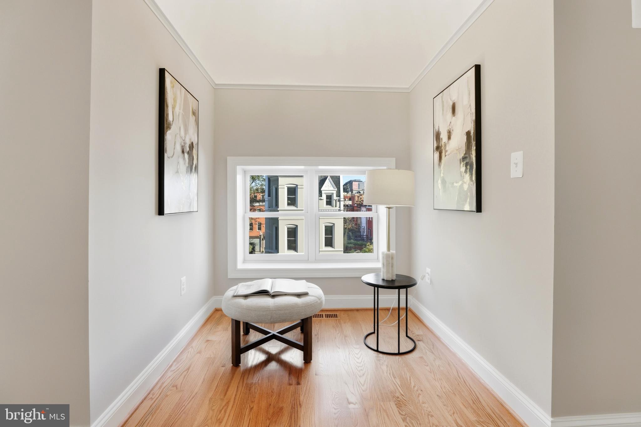 910 Westminster Street Northwest Washington, DC 20001 - Photo 40 of 66 a view of a workspace with furniture and wooden floor