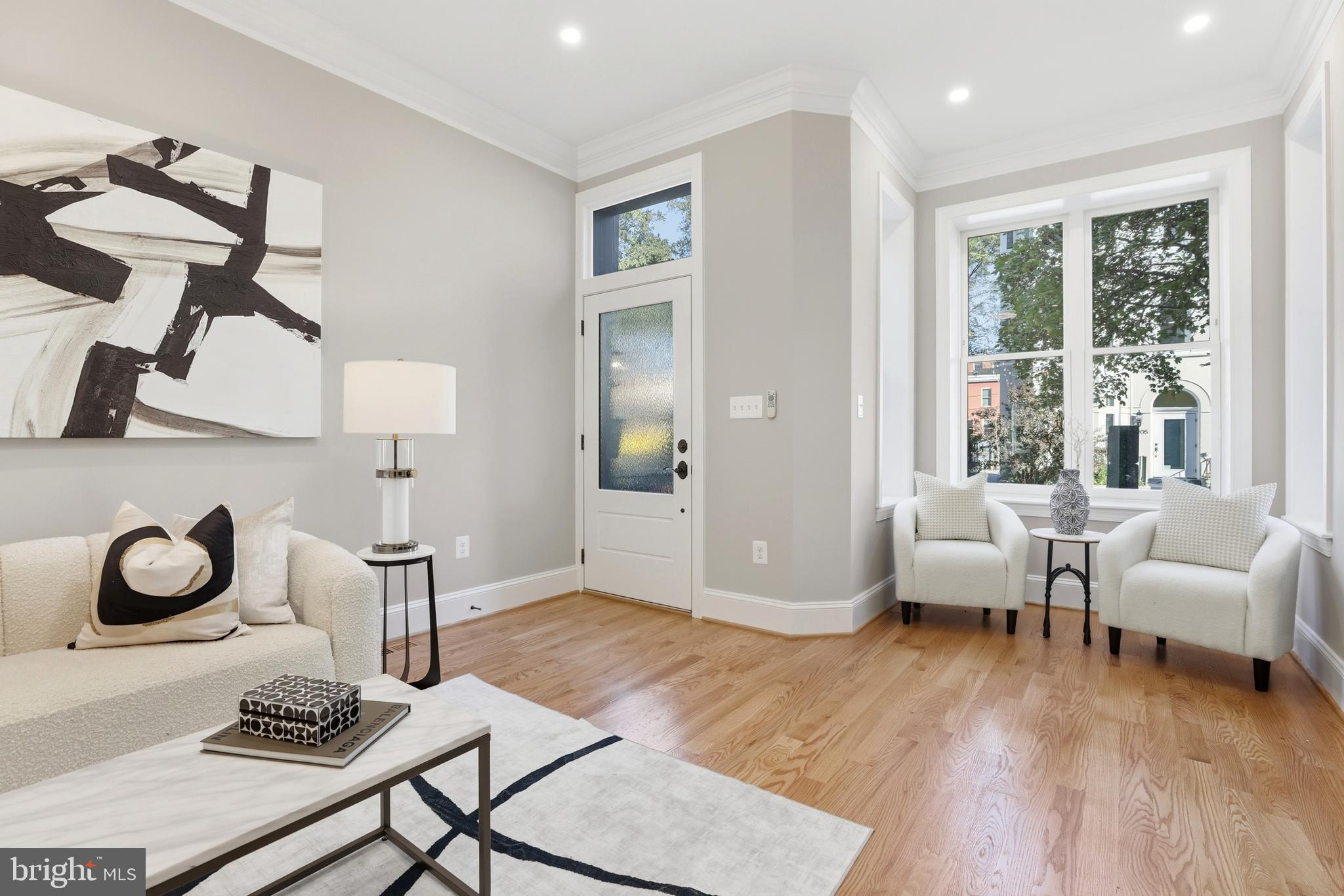 910 Westminster Street Northwest Washington, DC 20001 - Photo 4 of 66 a living room with furniture and wooden floor