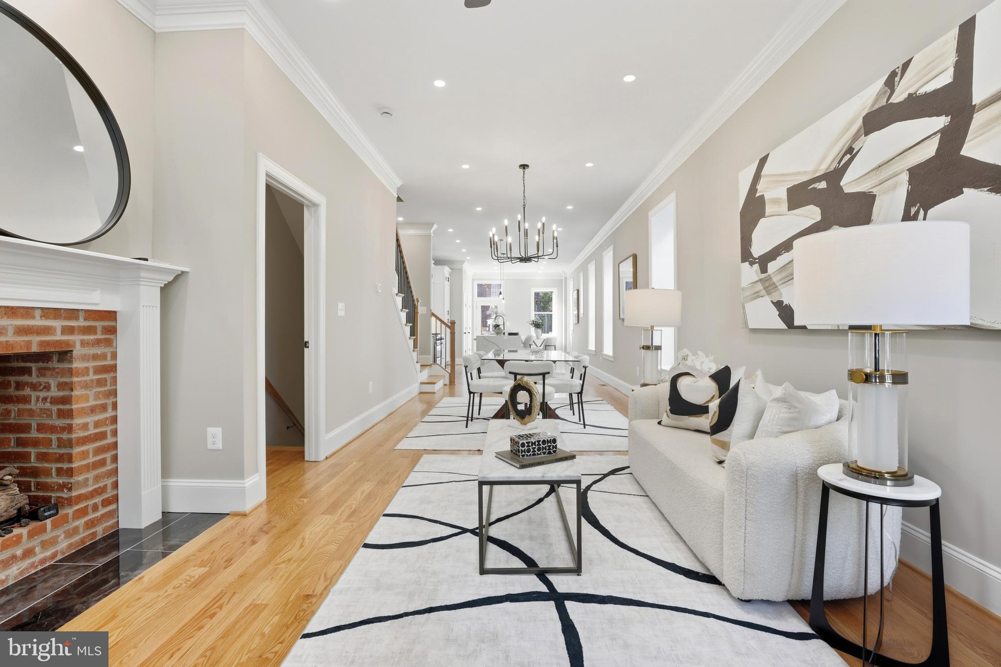 910 Westminster Street Northwest Washington, DC 20001 - Photo 5 of 66 a view of a kitchen with dining table and chairs