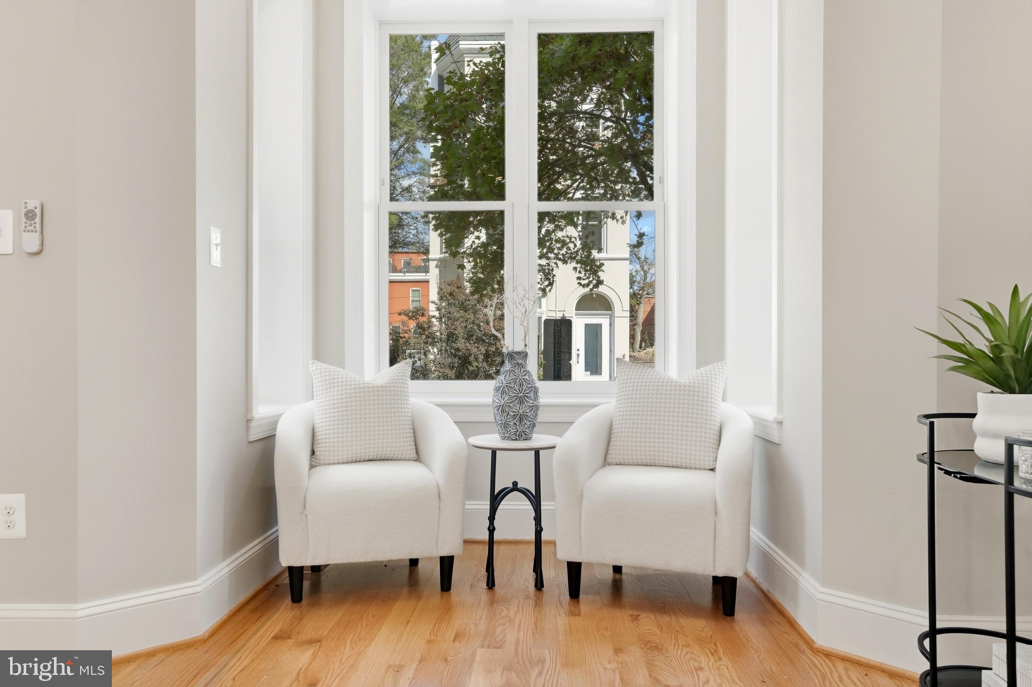 910 Westminster Street Northwest Washington, DC 20001 - Photo 7 of 66 a living room with furniture and a wooden floor