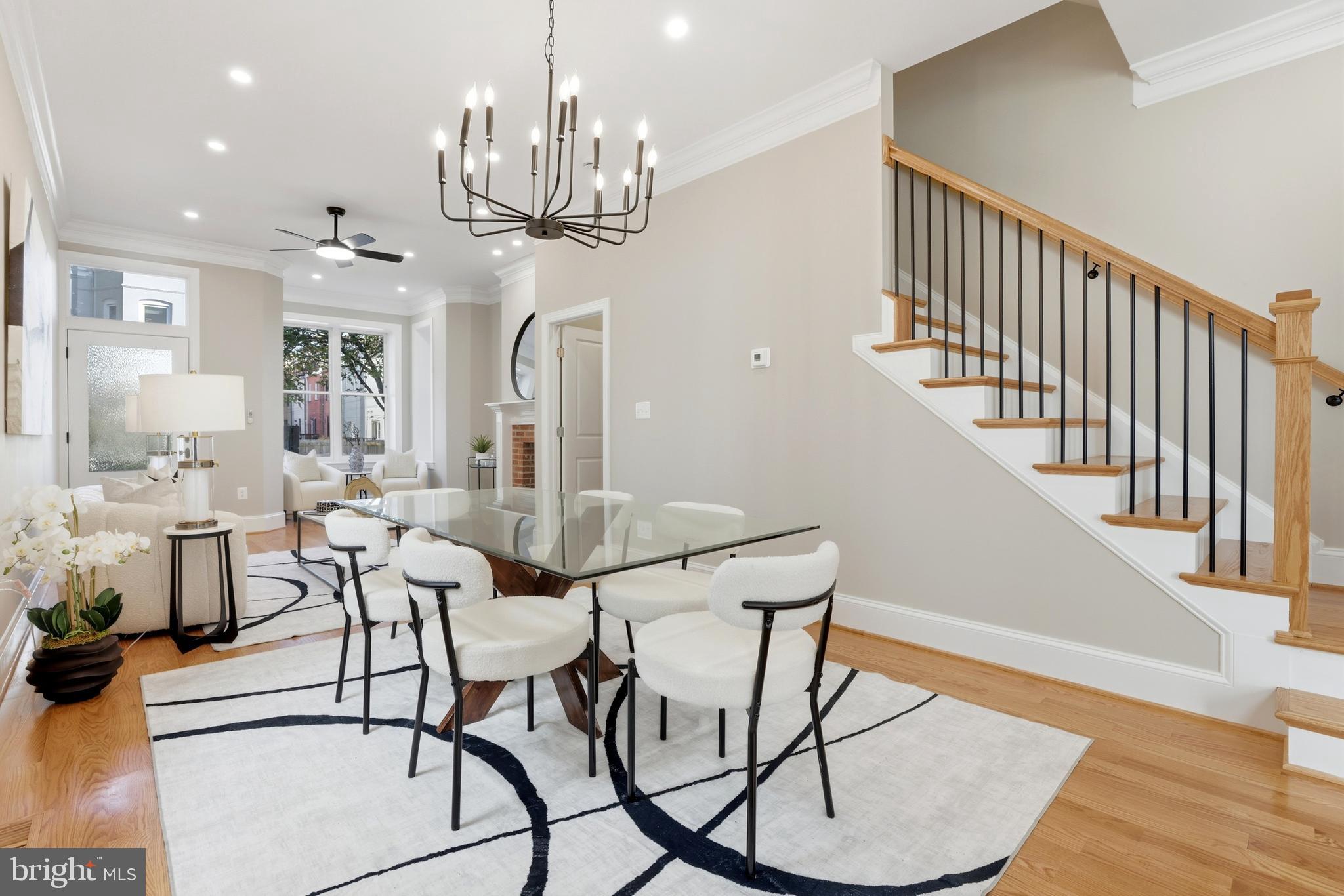 910 Westminster Street Northwest Washington, DC 20001 - Photo 10 of 66 a view of a dining room with furniture and a chandelier