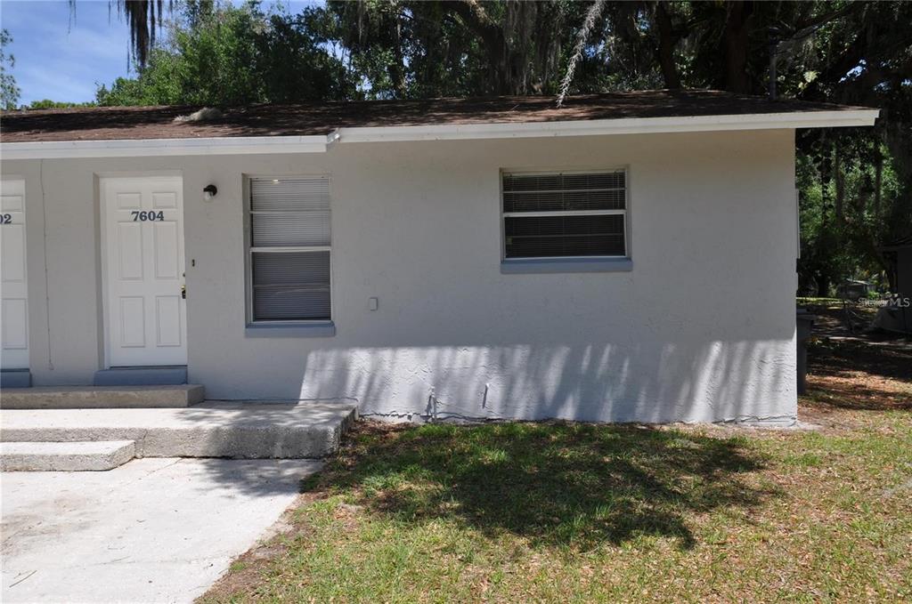 7604 Chase Road Lakeland, FL 33810 - Photo 1 of 1 a view of backyard and outdoor space