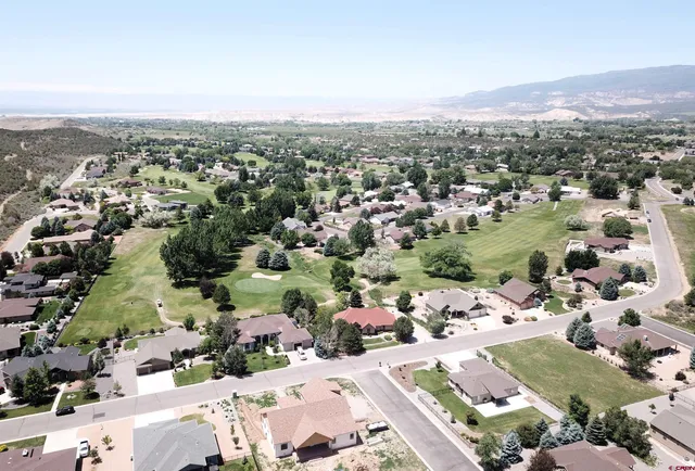 an aerial view of a city with lots of residential buildings
